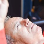 Strength Exercises - Man Training on Gym with Barbell