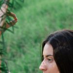 Recovery - Serene woman practicing yoga in forest