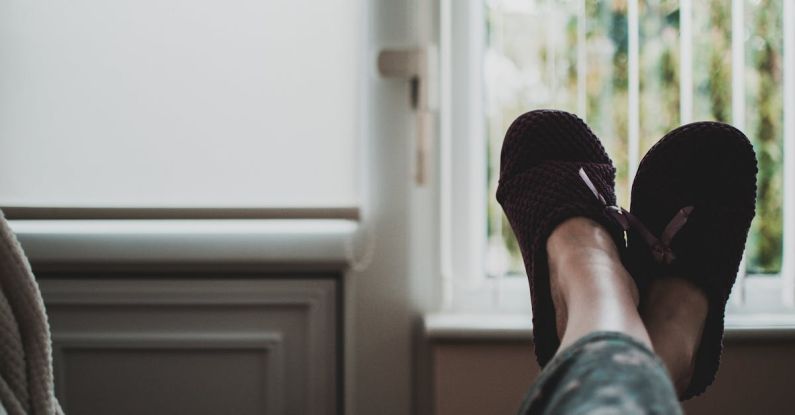 Rest - Person Wearing Pair of Black Slides