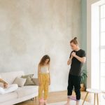 Resistance Bands - A Man and His Daughter Using Resistance Bands