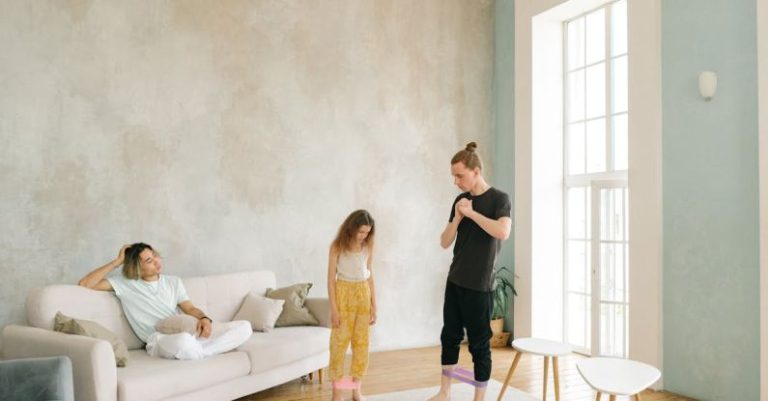 Resistance Bands - A Man and His Daughter Using Resistance Bands