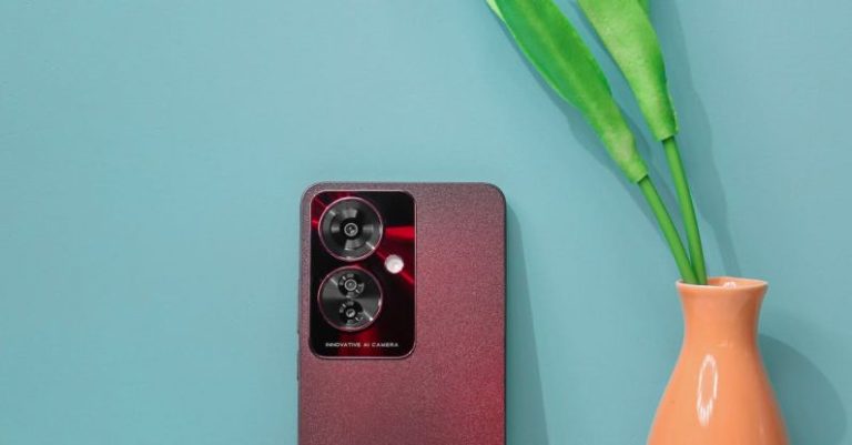 Track Progress - A red phone with a pink flower next to it