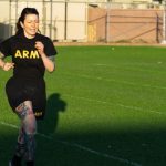 Steady-State Cardio - Woman Running on Sports Ground