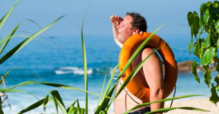 Hot Weather - Orange Safety Ring on Man Shoulder Near Body of Water
