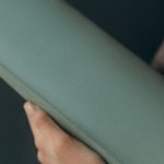 Fitness Routine - Woman Holding A Yoga Mat