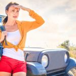 Hot Yoga - Woman in Yellow Long Sleeve Leaning on Blue Car