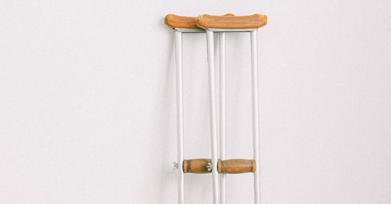 Recovery - Crutches against light white wall