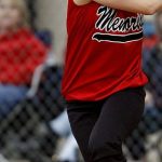 HIIT - Woman Wearing Baseball Bat in Field