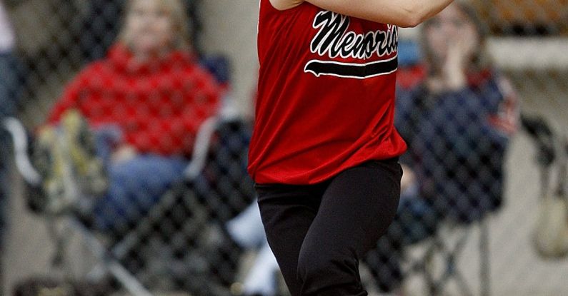 HIIT - Woman Wearing Baseball Bat in Field
